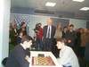 Before the game Svidler - Morozevich. The sport commentator of the Russian TV IM Nikolay Popov on the background.